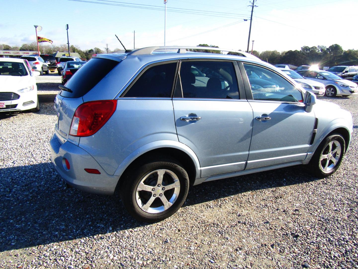 2014 Blue Chevrolet Captiva Sport 1LT FWD (3GNAL3EK9ES) with an 2.4L L4 DOHC 16V FFV engine, Automatic transmission, located at 15016 S Hwy 231, Midland City, AL, 36350, (334) 983-3001, 31.306210, -85.495277 - Photo#7